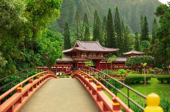 The red arched bridge leading to the Byodo-In Temple